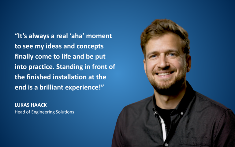 Portrait of Lukas Haack with quote: “It’s always a real ‘aha’ moment to see my ideas and concepts finally come to life and be put into practice. Standing in front of the finished installation at the end is a brilliant experience!”